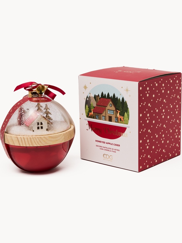 Glass globe candle with a Christmas scene