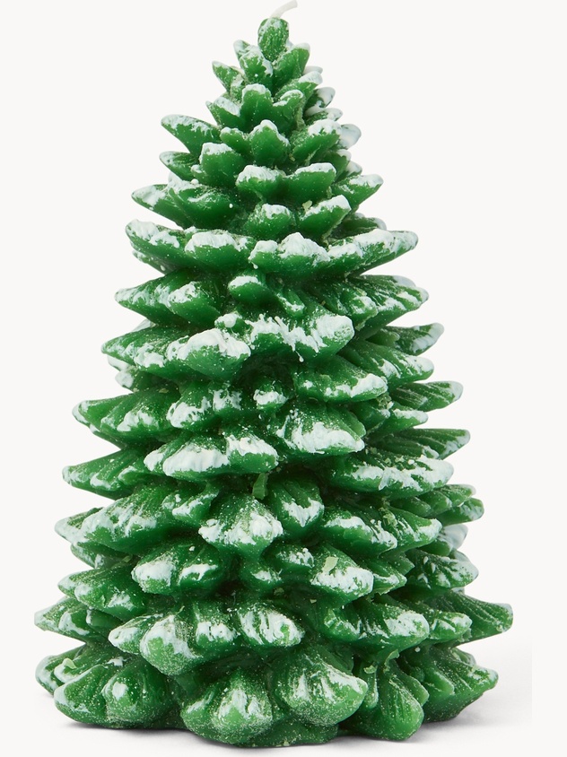 Snow-covered Christmas tree-shaped candle