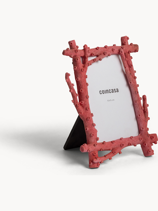 Photo frame with hand-finished frame
