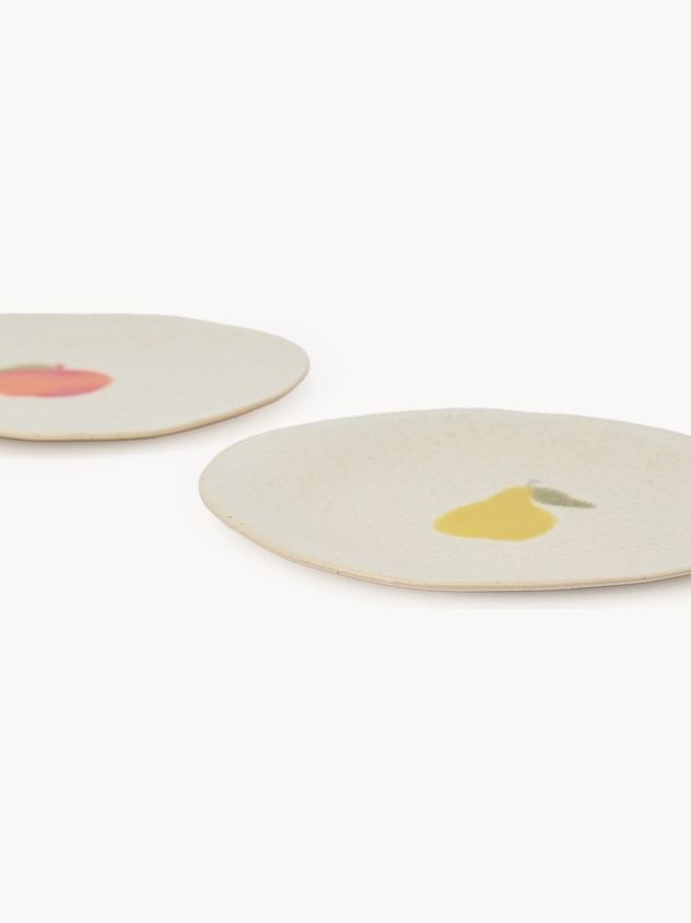 Ceramic saucer with fruit motif