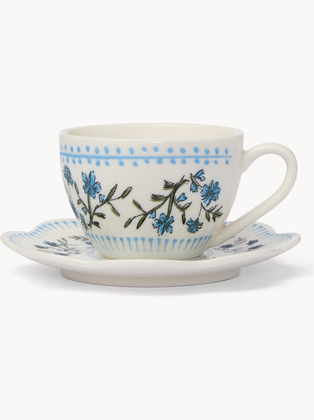 Porcelain coffee cup with flower motif