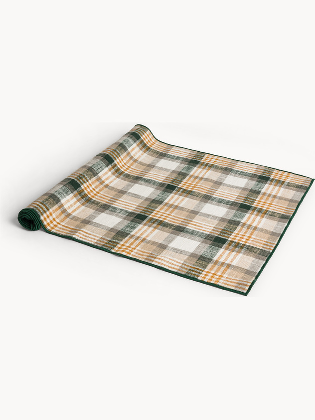 Checked table runner in pure yarn-dyed cotton with contrasting overlock