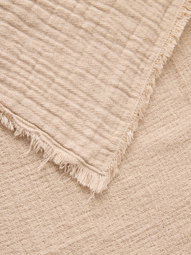 Solid-colored washed cotton gauze bedspread