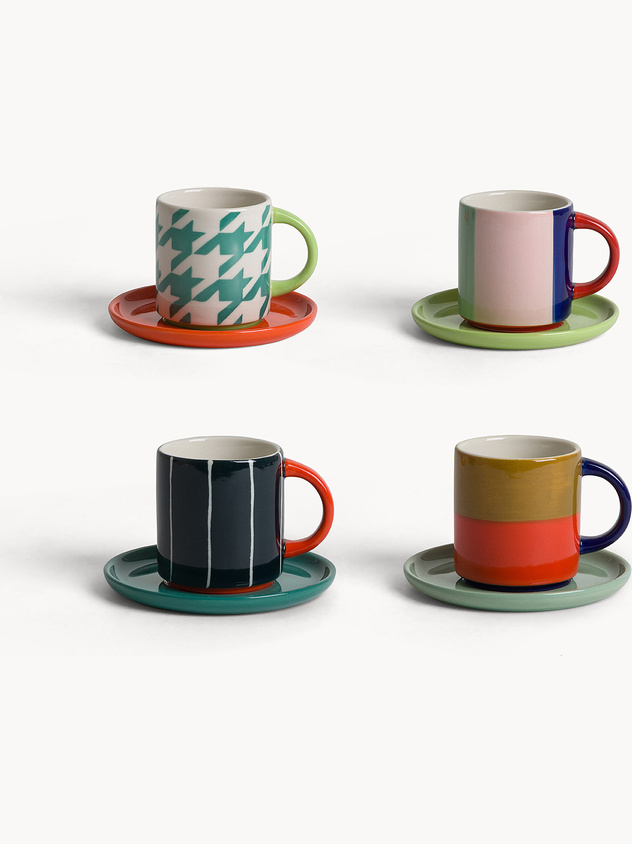 Ceramic coffee cups with abstract motifs