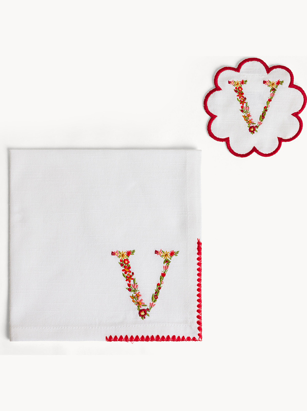 Napkin and coaster set with embroidered letter V
