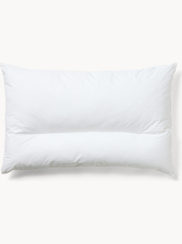Adjustable ergonomic pillow in microspheres