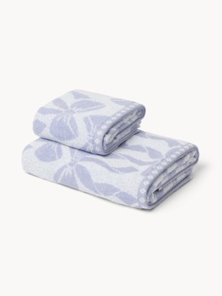 Asciugamano  bicolor in spugna di cotone  con fantasia fiocchi - Prezzo di lancio