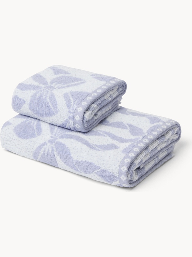 Asciugamano  bicolor in spugna di cotone  con fantasia fiocchi - Prezzo di lancio