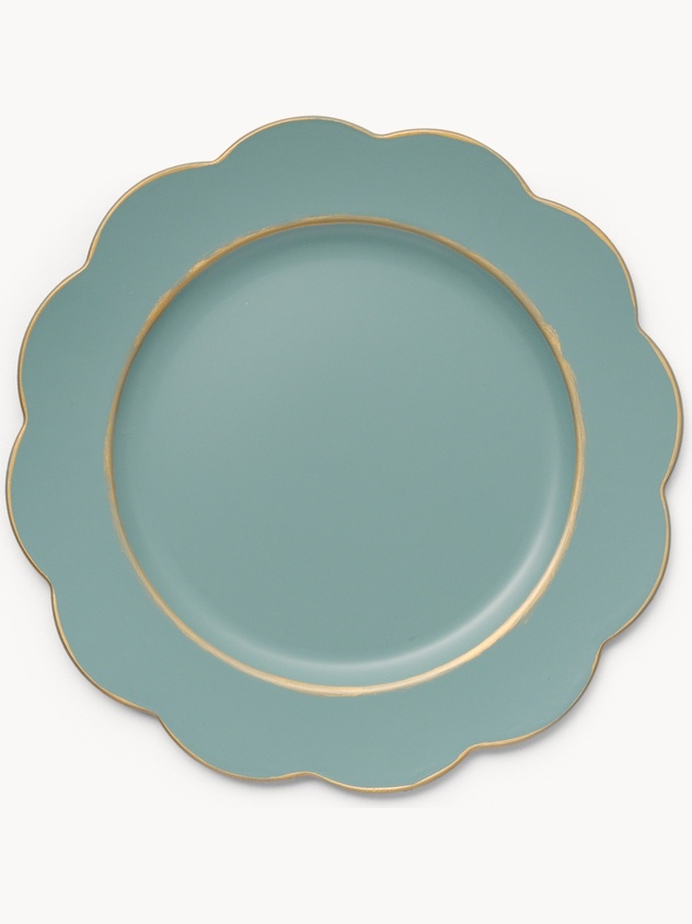 Sottopiatto in plastica con bordo ondulato