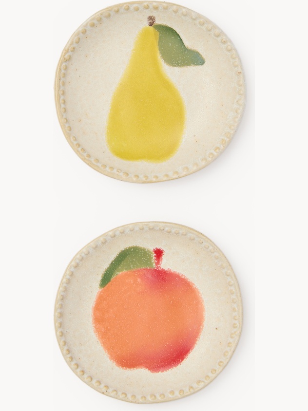 Ceramic saucer with fruit motif
