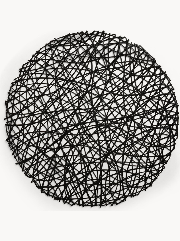 Plastic placemat with a perforated pattern