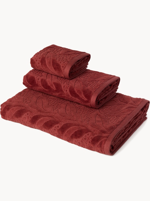 Cotton velour towels with a jacquard leaf motif