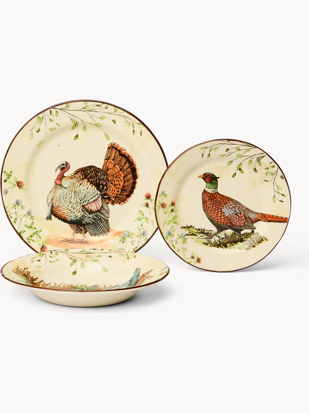 Set of 18 ceramic plates with game motif