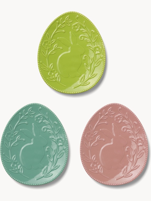 Ceramic egg-shaped saucers