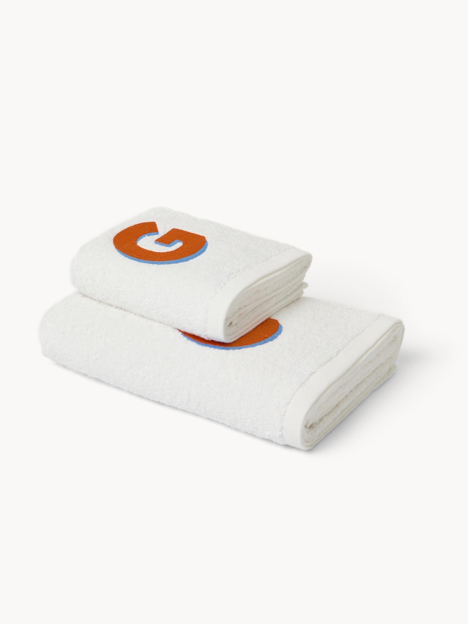 Set 2 asciugamani in spugna di cotone ricamo lettera G, Bianco, large image number 0