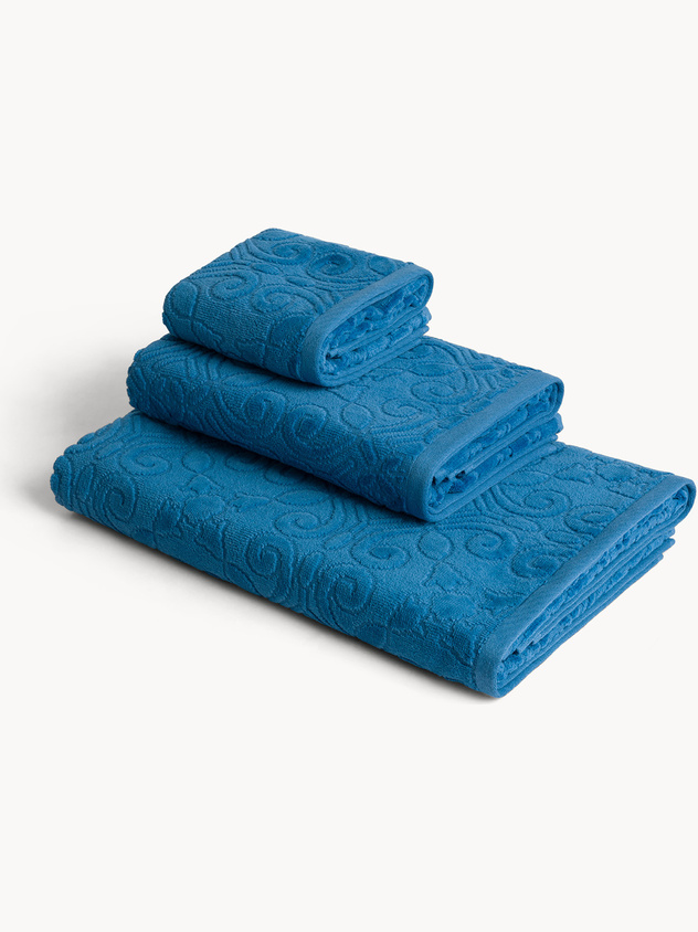 Asciugamano in cotone velour con finitura in rilievo