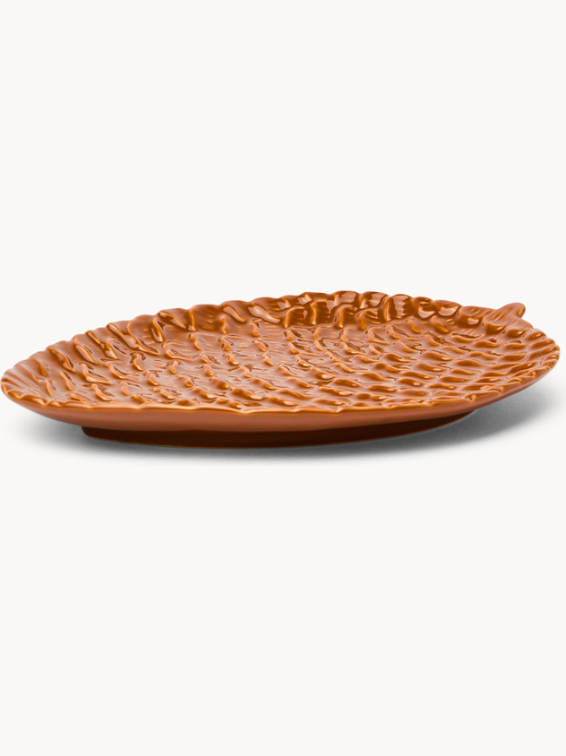 Ceramic plate with pine cone motif