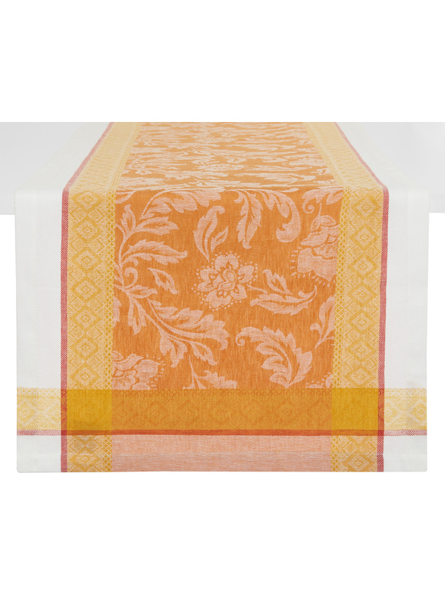 Linen and cotton table runner with ornamental motif