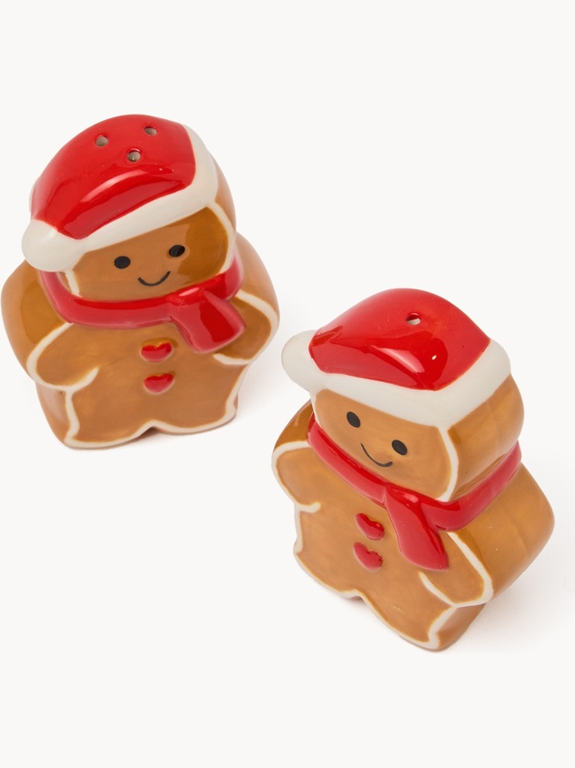 Ceramic salt and pepper shaker set shaped like a gingerbread man