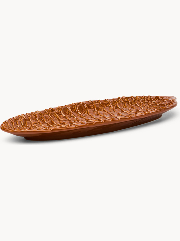 Oval ceramic plate with pine cone motif